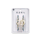 TAILS DOWN BOW MINI HAIR CLAW